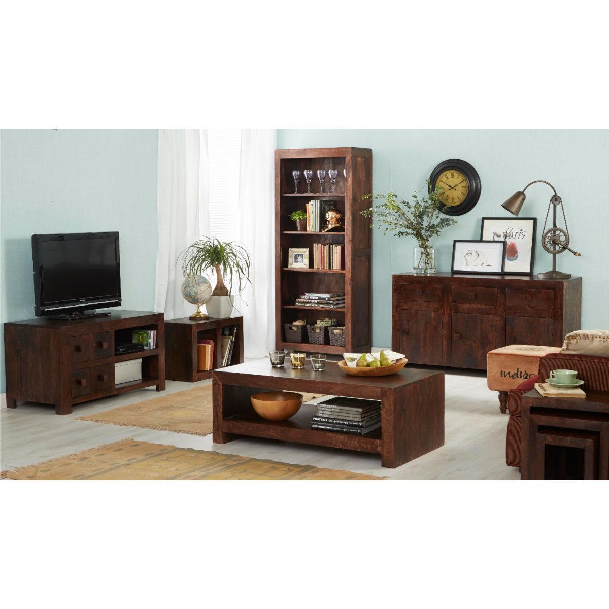 Wooden living room furniture set with TV stand, bookshelf, and coffee table.