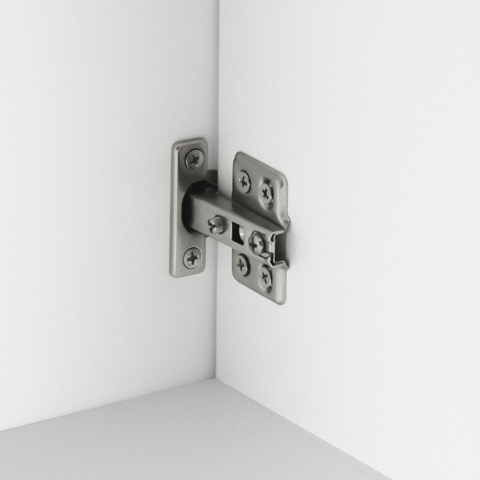 Metal cabinet hinge on a white surface